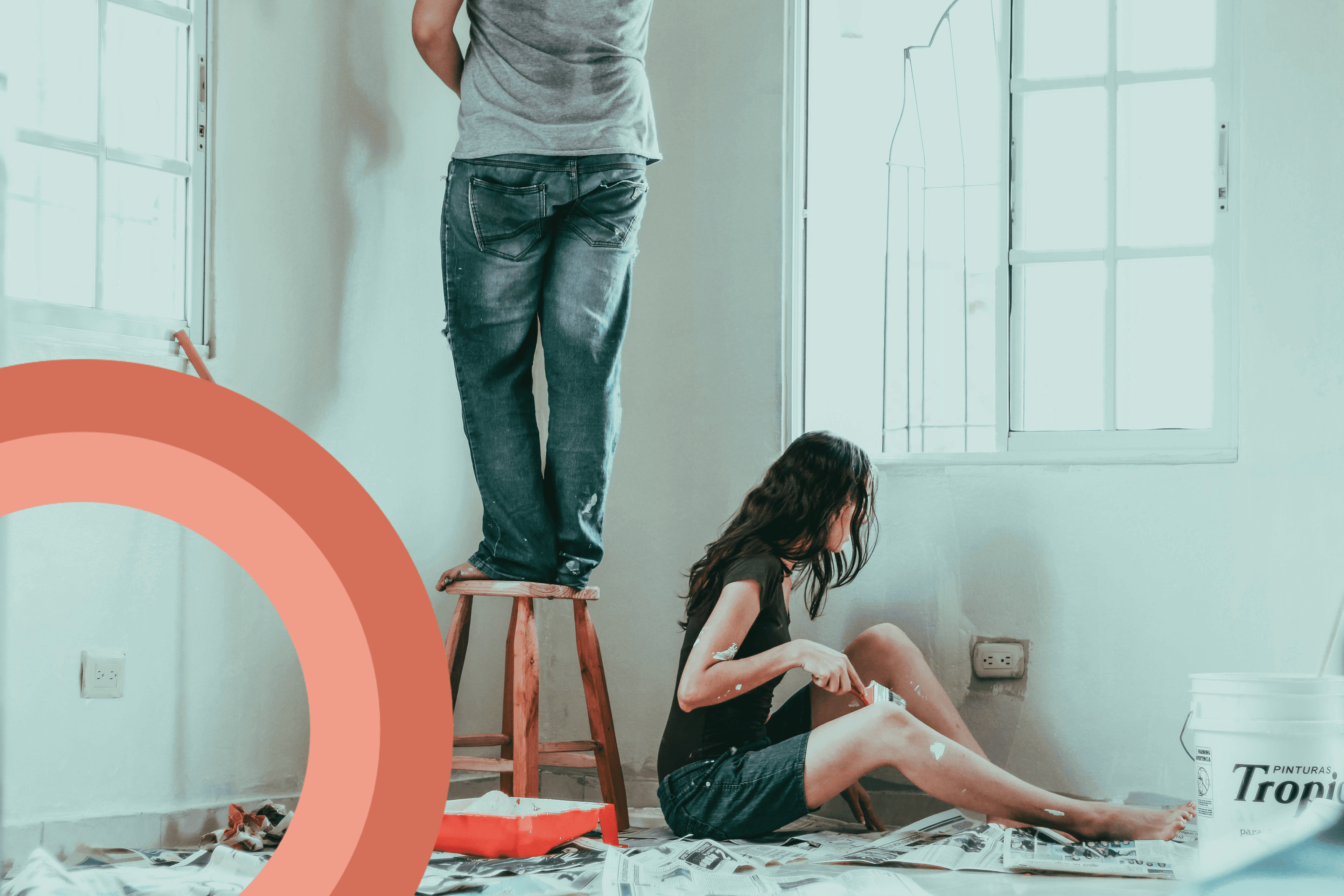 Couple painting a room