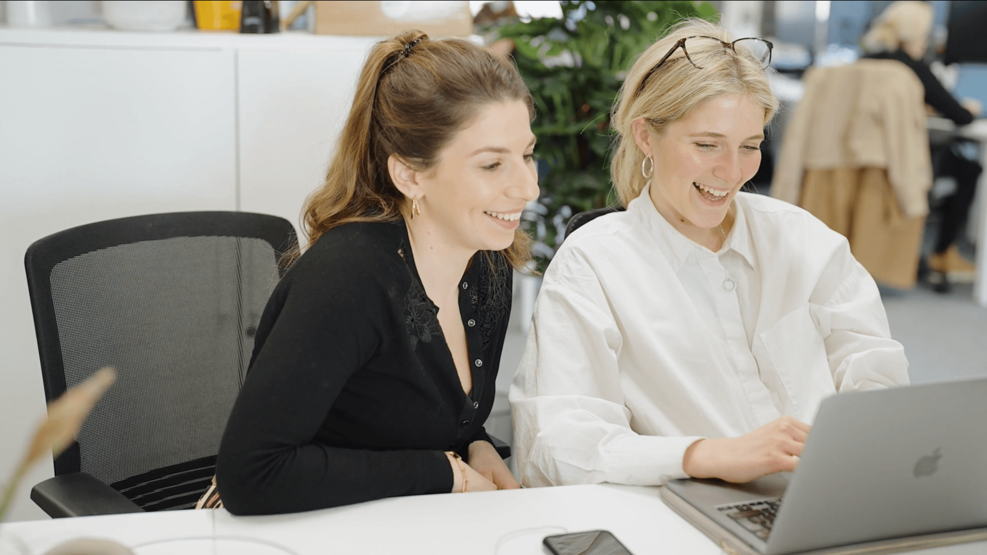 Two Thirdfort female employees working together in the office